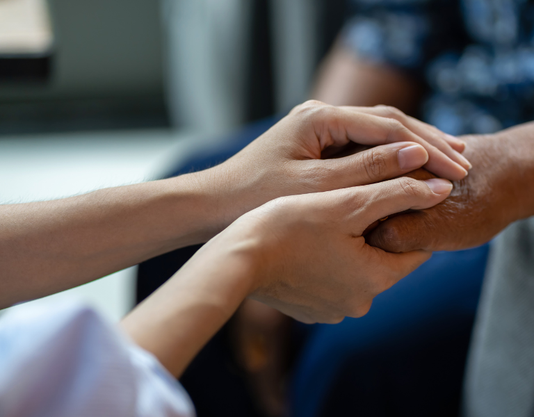 A stock image representing someone caring for another person.