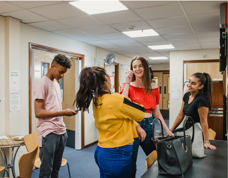 A stock photo of four young people, representing Youth Work.