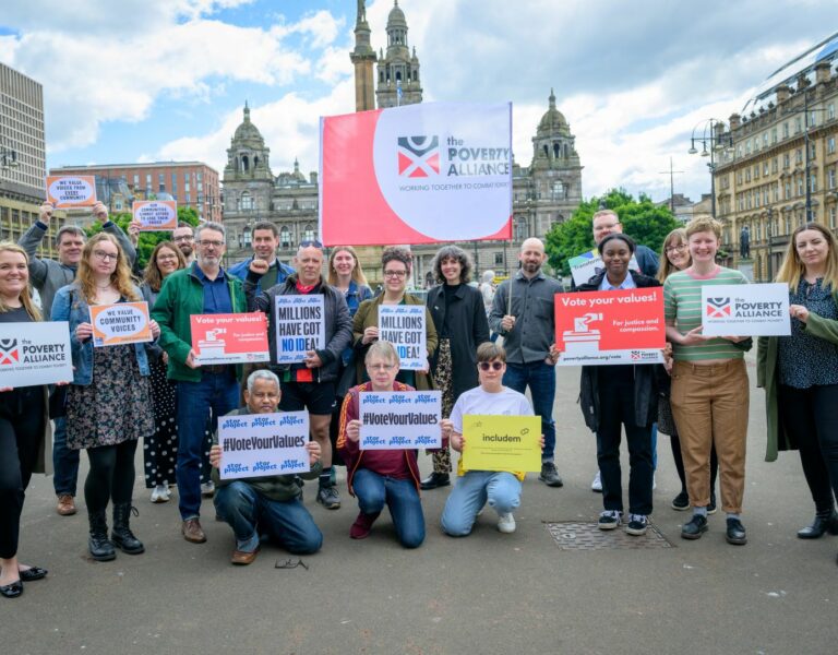 Poverty Alliance members take part in a #VoteYourValues photocall