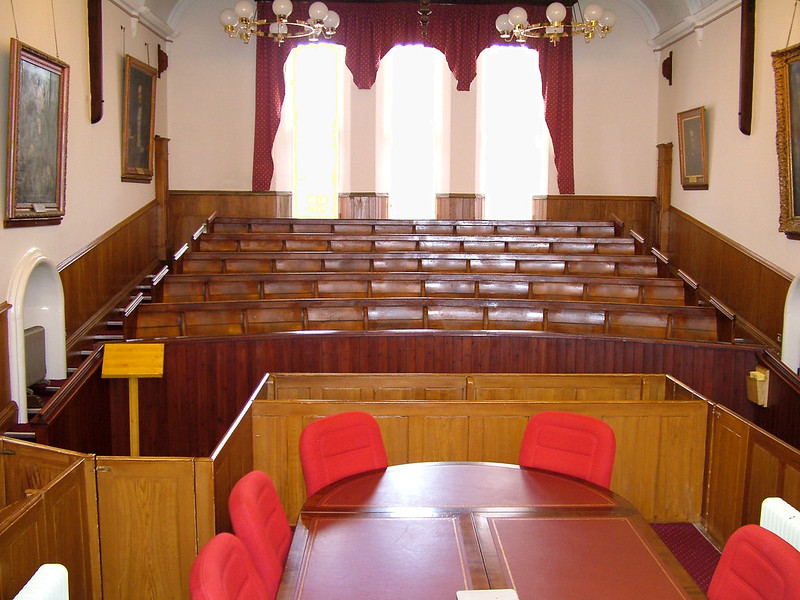 Scottish Sheriff Court, looking down from where the Judge Sheriff would sit. Image courtesy of Mike McBey https://www.flickr.com/photos/158652122@N02/