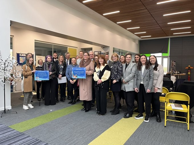 A group of men and women at HMP Grampian, attending a roundtable event by charity Families Outside